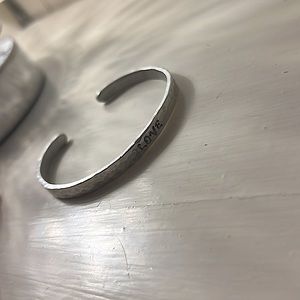 Silver “love” bracelet